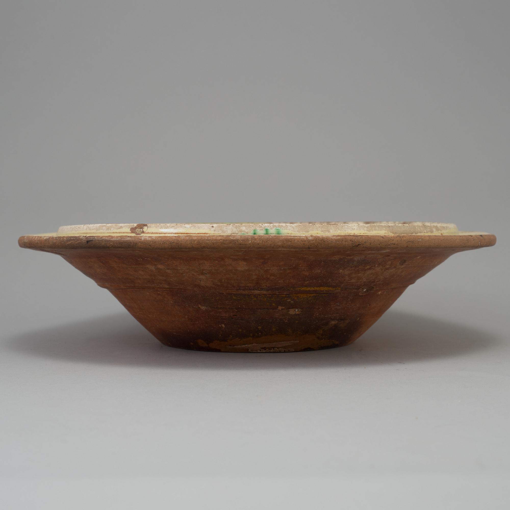 a earthenware plate dated 1782.