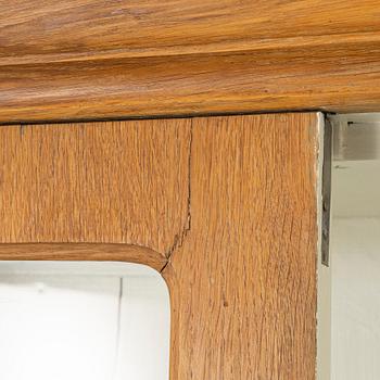 Display cabinet, circa 1900.