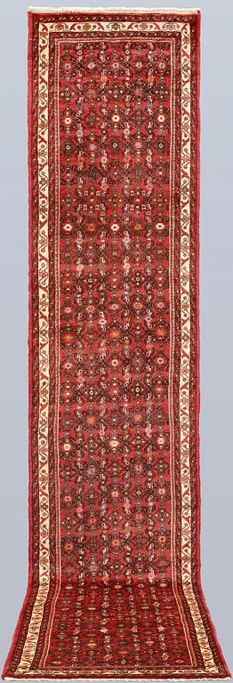 A Hosseinabad runner, c. 381 x 81 cm.