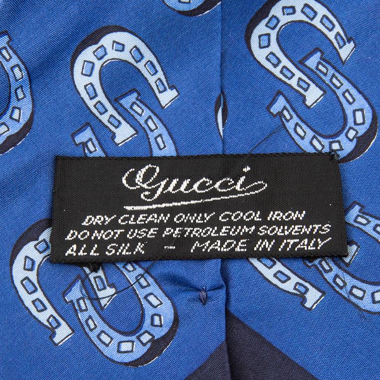 Gucci,.