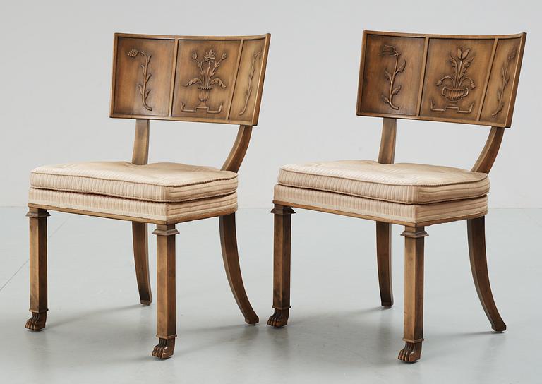 A pair of Axel Einar Hjorth 'Caesar' stained birch chairs by NK 1928.