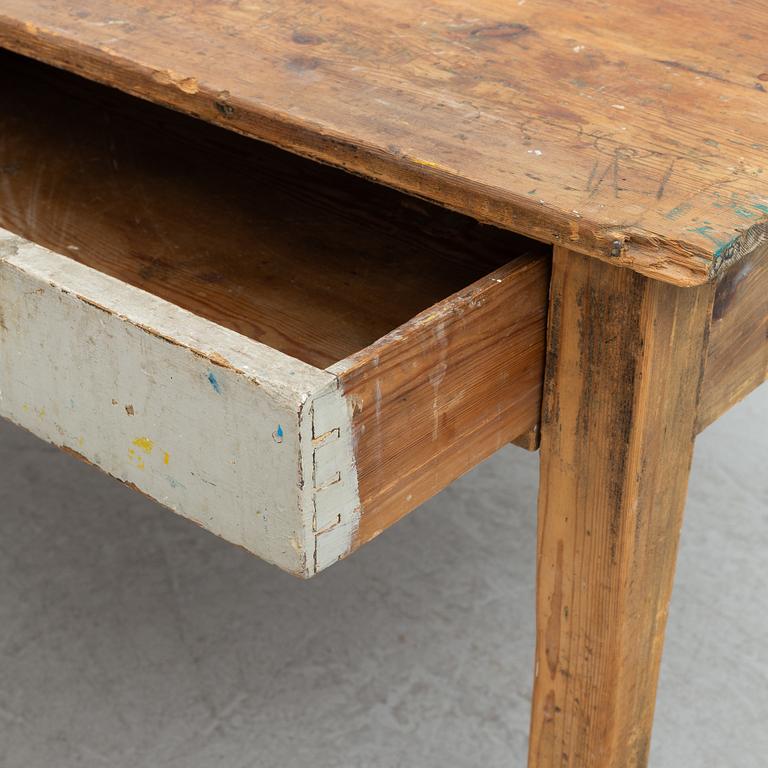 An early 20th century pine table.