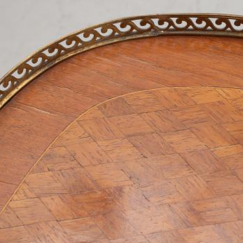 A Louis XVI-Style Chest of Drawers, early 20th Century.