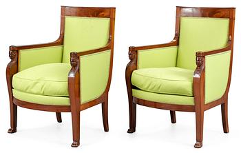 28. A pair of French Empire early 19th century bergeres.