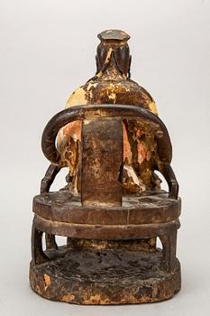 A Chinese late Qing painted wooden sculpture.