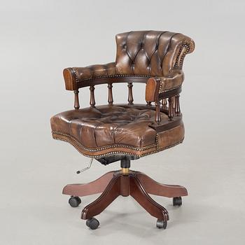 A desk chair in English style, made in the second half of the 20th century.