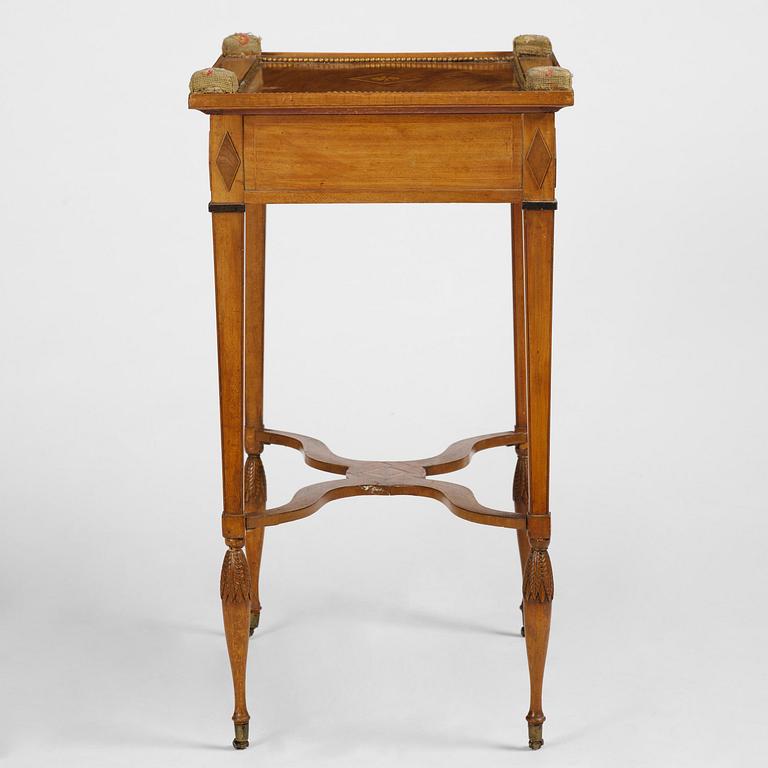 A late Gustavian mahogany table attributed to L. Qvarnberg (master in Stockholm 1801-13).