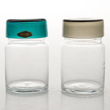 SAARA HOPEA, A set of five 1950s glass jars with covers by Nuutajärvi, Finland.