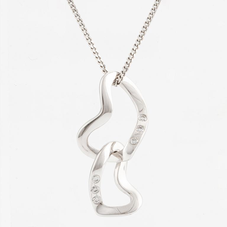 Georg Jensen pendant with chain in 18K white gold with round brilliant-cut diamonds.