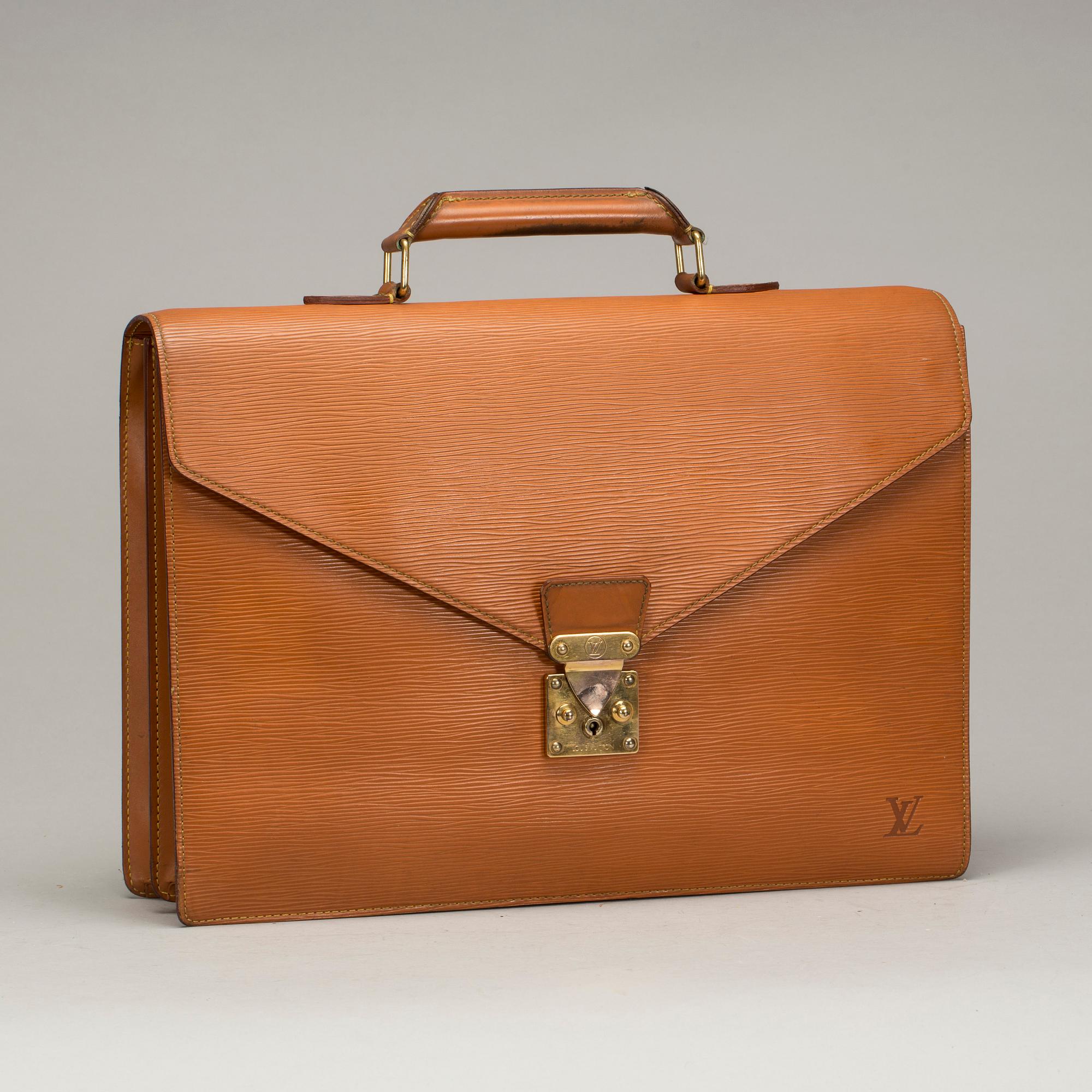 PORTFÖLJ, "Serviette conseiller ambassadeure Epi", Louis Vuitton, Paris, Frankrike.