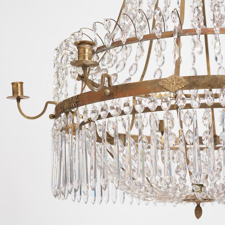 A late Gustavian nine-light gilt brass and cut glass chandelier, Stockholm, late 18th century.