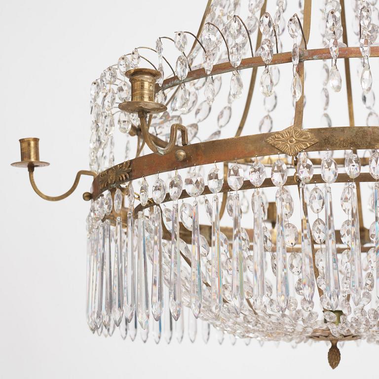 A late Gustavian nine-light gilt brass and cut glass chandelier, Stockholm, late 18th century.