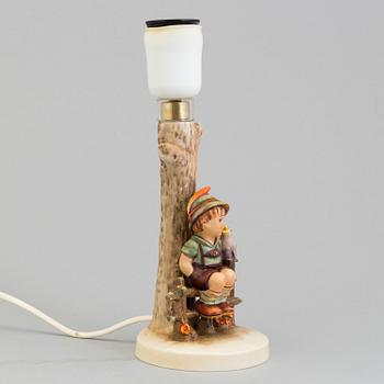 A Hummel porcelain lamp from Goebel, West Germany.