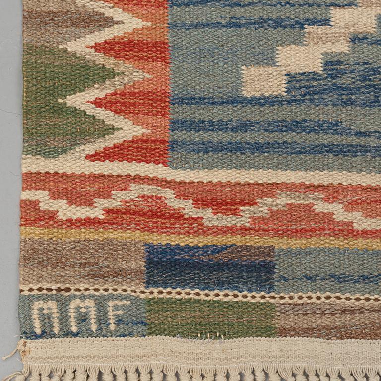 Märta Måås-Fjetterström, A carpet, "Blå taggen", flat weave, ca 304,5-306 x 202,5 cm, signed MMF.