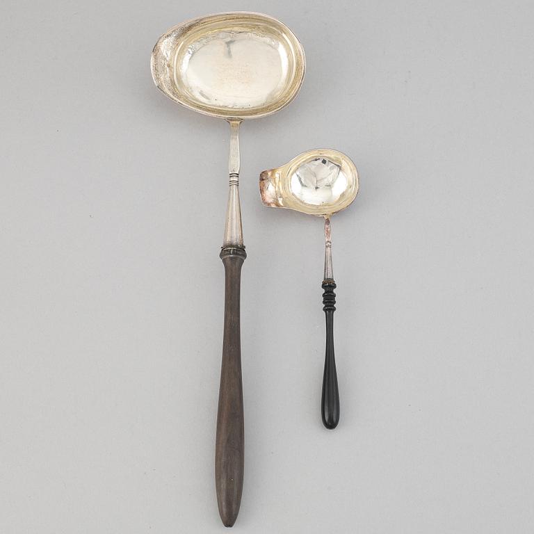 Two silver ladles, by Carl August Nilsson, Malmö, 1882, and Isak Gustaf Sundström, Söderköping, 1875.