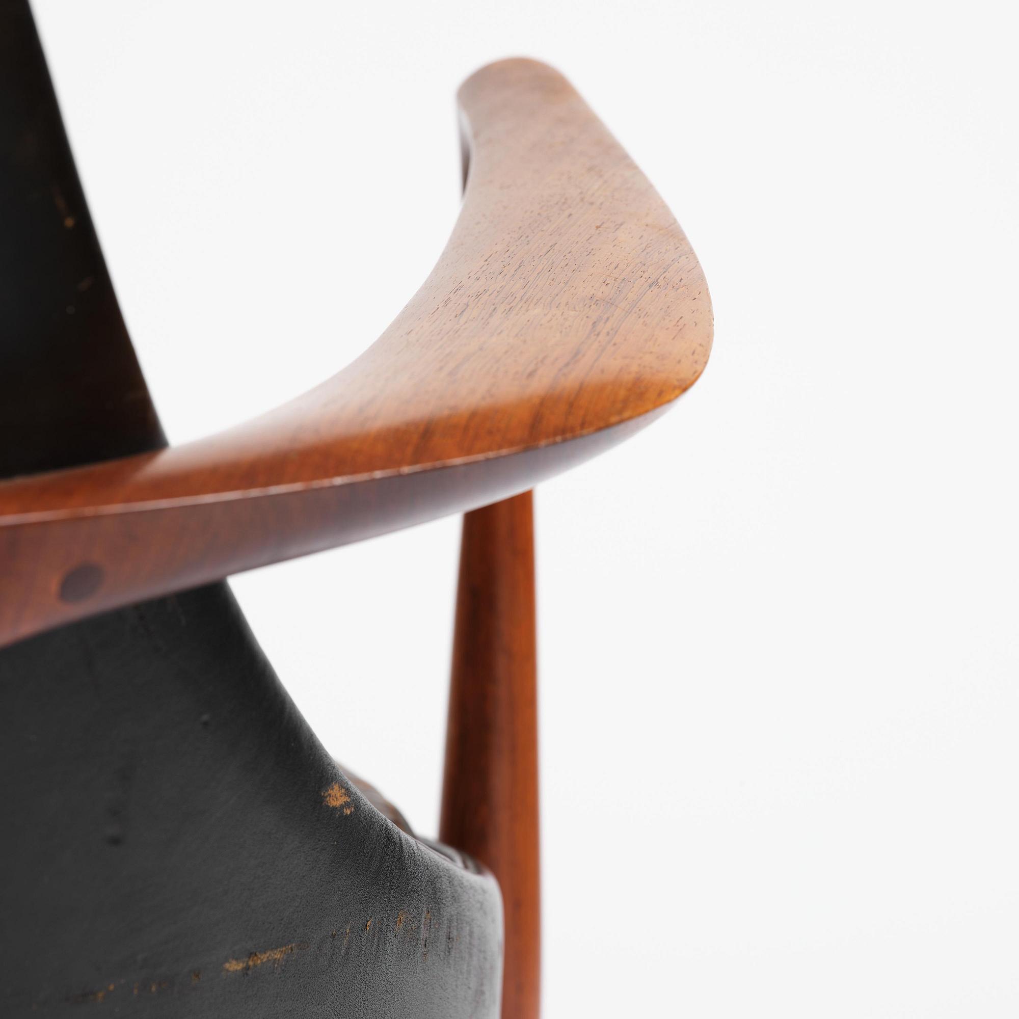 Ib Kofod-Larsen, a rosewood "Elizabeth" easy chair, cabinetmakers Christensen & Larsen, Denmark, 1950s-60s.