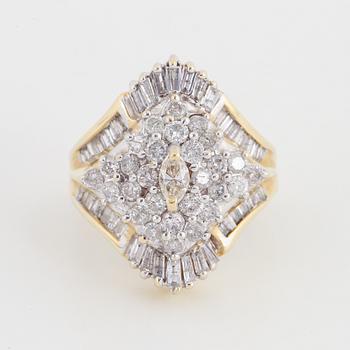 14K gold and diamond ring.