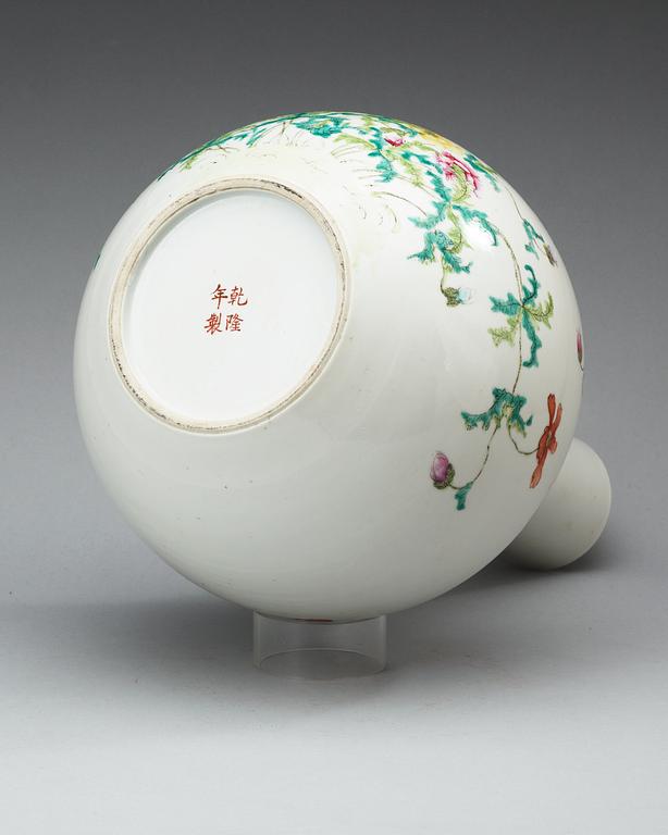 A famille rose vase, late Qing dynasty, with Qianlongs four character mark in red.