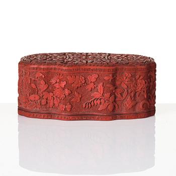 A fine carved lacquer box and cover with tianqi lacquer inset boxes and covers, Qing dynasty, Qianlong (1736-95).