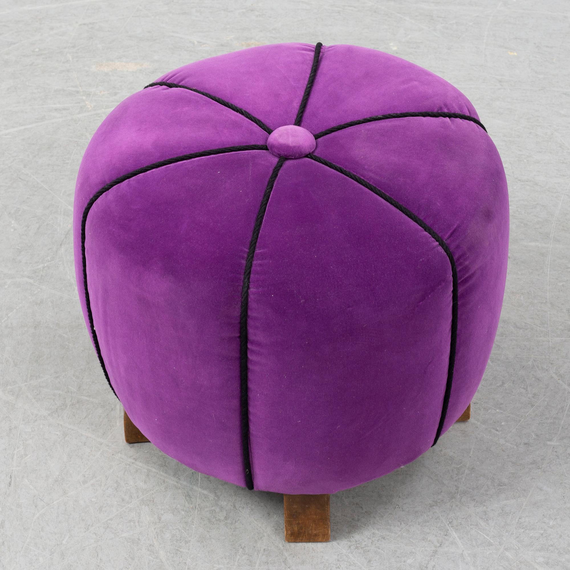 A 1940's table with pouf.