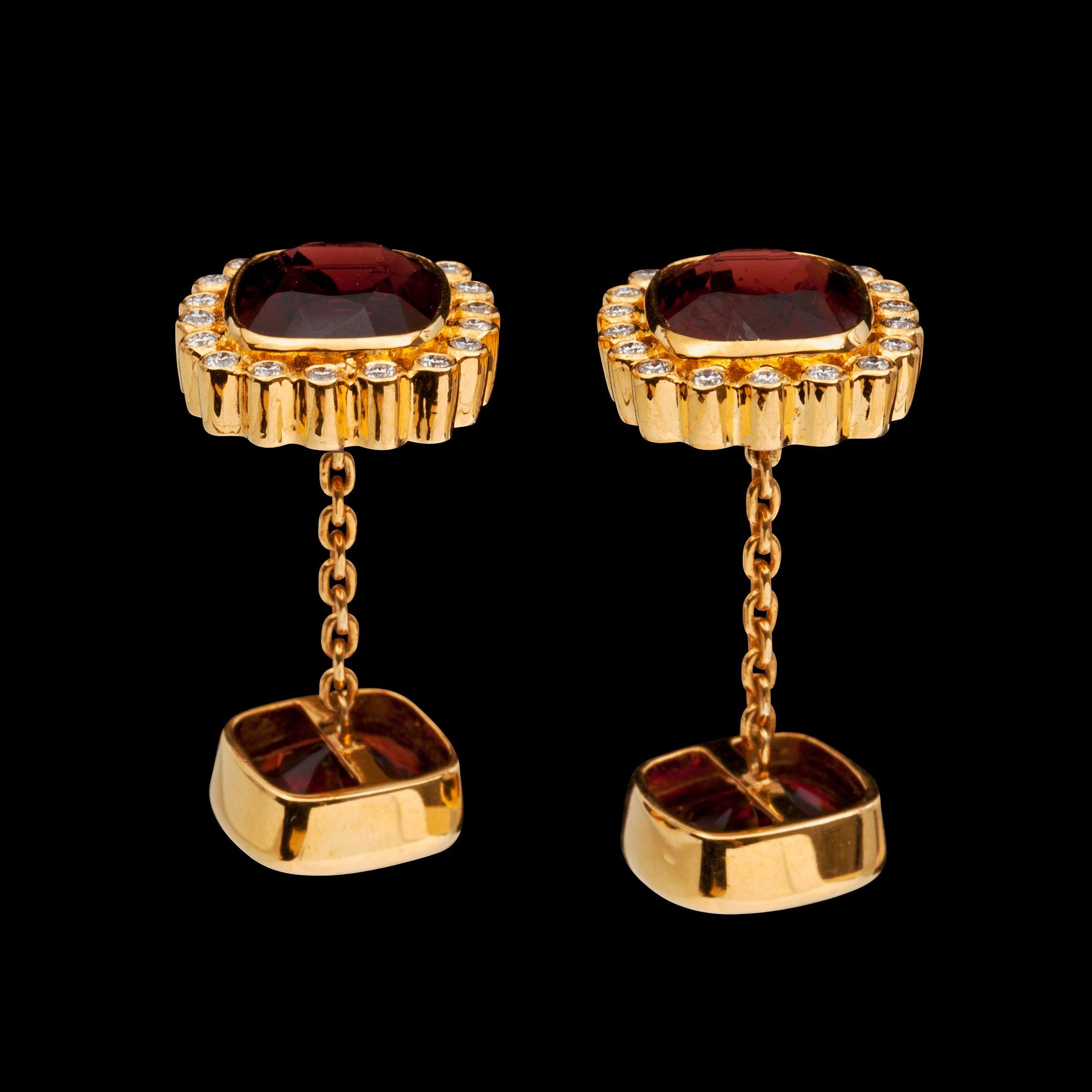 A pair of spinel and diamond cufflinks.