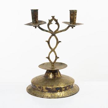 A Swedish brass two-branch candlestick, 18th/first part 19th century.