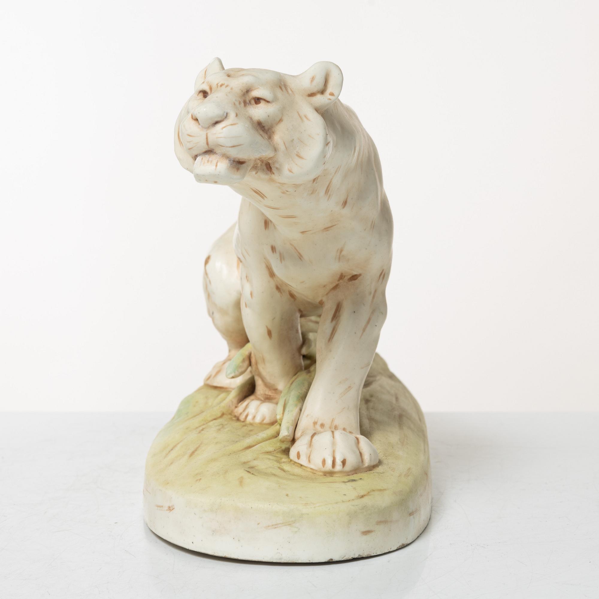 Otto Jarl, a porcelain figurin of a tiger, probably from Royal Dux, Germany.