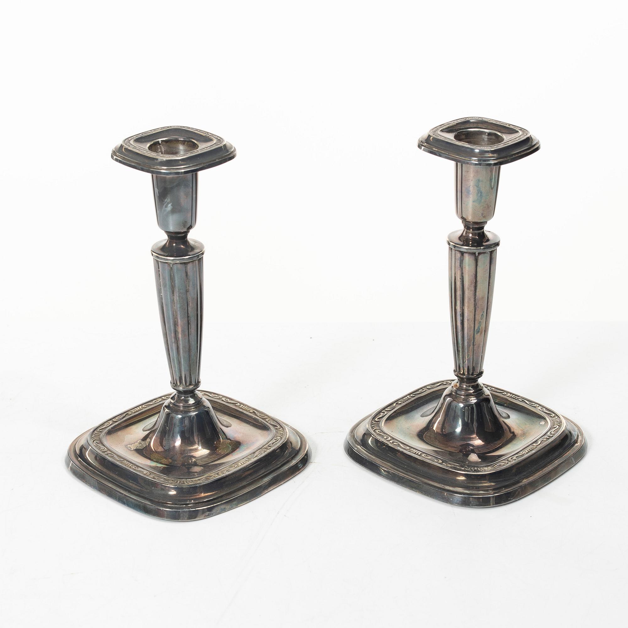 A pair of sterling silver candlesticks, C.G.Hallberg, Stockholm, Sweden, 1959.