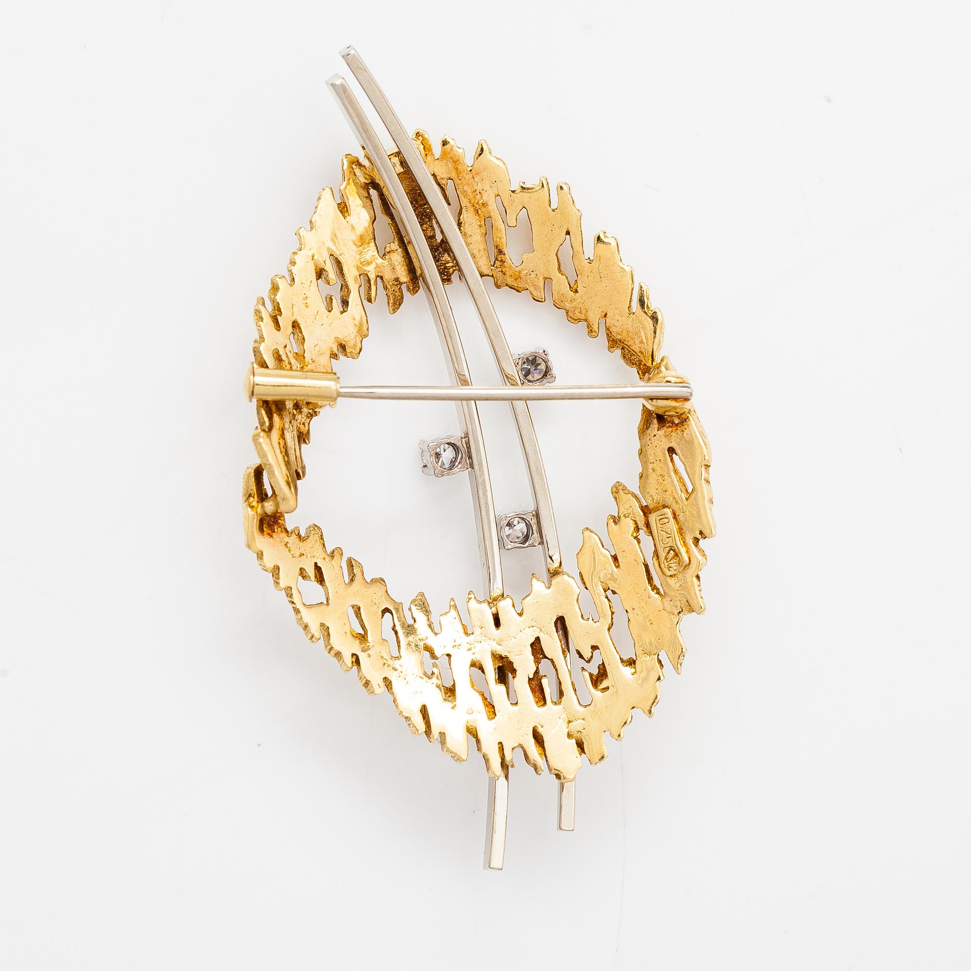Brosch, 18K guld och diamanter ca 0.09 ct tot.