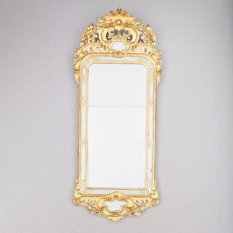A Swedish Rococo mirror dated 1771.