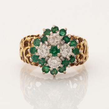 18K gold and brilliant cut diamond and emerald ring.