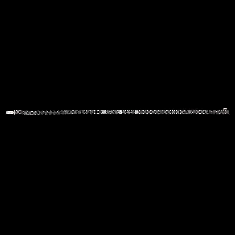 A black brilliant cut diamond bracelet, tot. app. 6.30 cts.