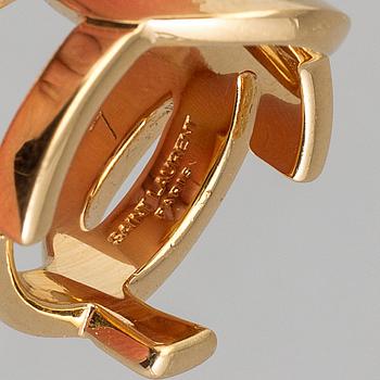 YVES SAINT LAURENT, a metal ring, size 7.