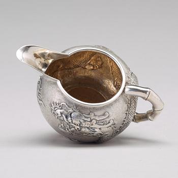 A Chinese four piece silver tea set, Luen Wo, Shanghai, 1875-1925.