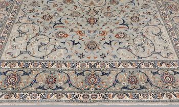 A carpet, Kashan, signed, ca 404 x 280 cm.