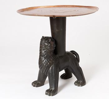 Anna Petrus, a table, Sweden early 1920's. By the artist, sculptured oak with an engraved copper tray.