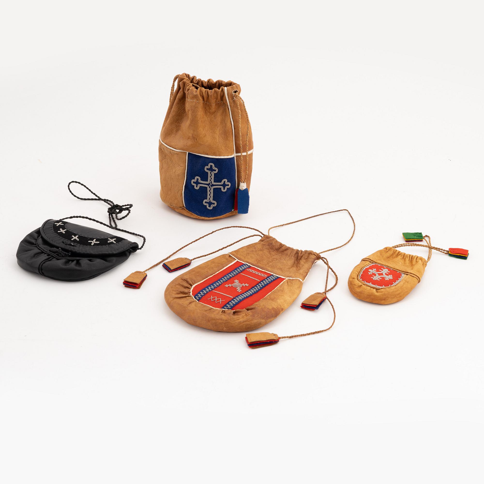 Four leather pouches.