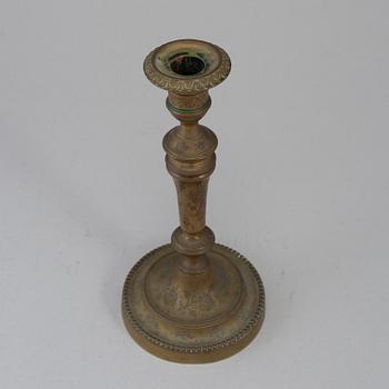 A late 18th century bronze candlestick.