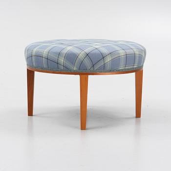 Josef Frank, a model 647 cherry wood stool by Firma Svenskt Tenn.