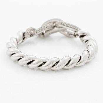 Hermès a bracelet 18K white gold with round brilliant-cut diamonds.