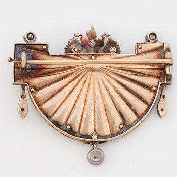 FABERGÉ, Nobelbrosch, guld, emalj och diamanter.