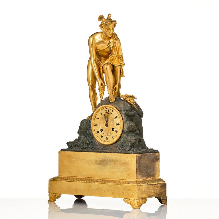 A French Empire ormolu and patinated bronze mantel clock, Paris, early 19th century.