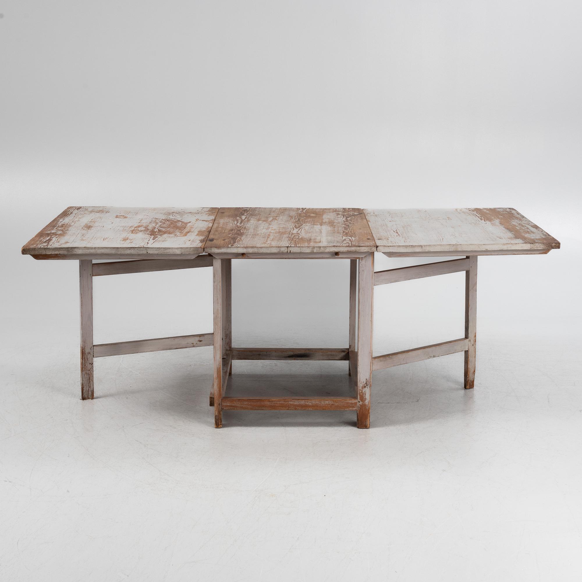A painted gate leg table, 19th Century.