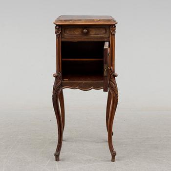 A late 19th century rococo style bedside table.