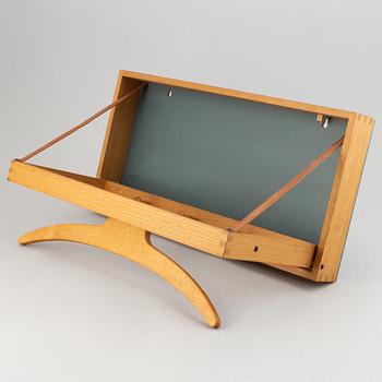 A clothes hanger by Adam Hoff & Poul Östergaard, Virum Möbelsnickeri, Denmark, mid 20th.