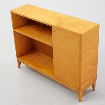 A birch bookcase with cabinet, 1930's/40's.