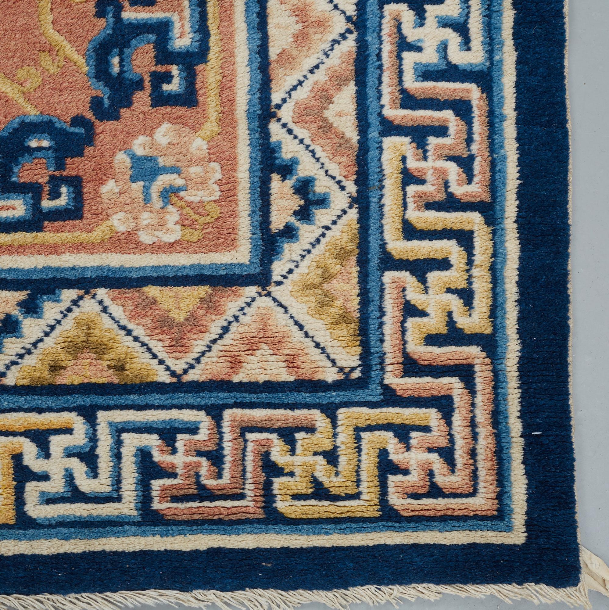 A CARPET, a semi-antique Ningxia, ca 197 x 127 cm.