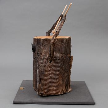 A drumming tree stump made by JoAnn Tan Studio for NK 2016.