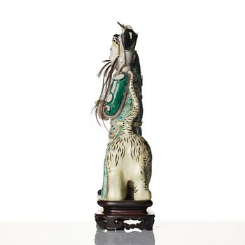 A famille verte bisquit figure of a warrior, Qing dynasty, 19th century.