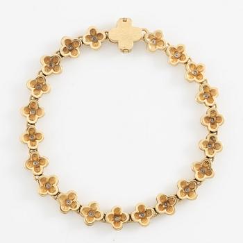 Armband, 18K guld med briljantslipade diamanter.